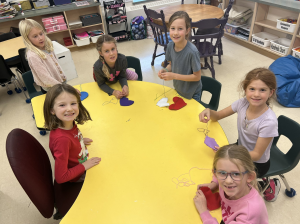 Group of students sewing